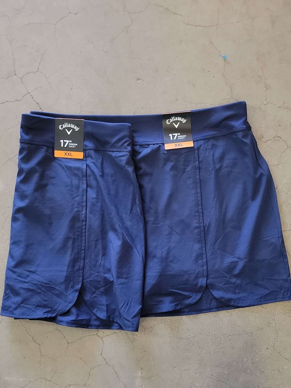 Pair Of Callaway Women's Golf Skort in Navy Blue